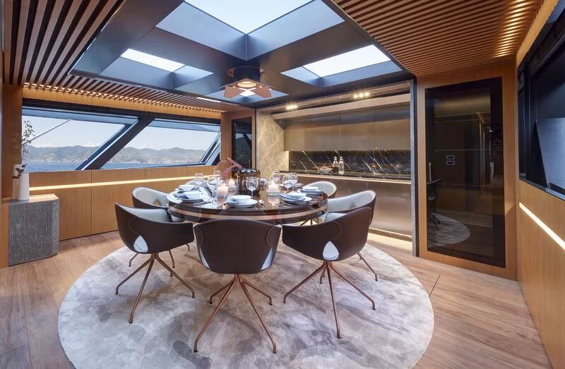 a table and chairs in a room aboard BLUE JEANS Yacht for Sale