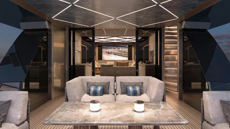 a living room with a large wood table and a large window aboard BLUE JEANS Yacht for Sale