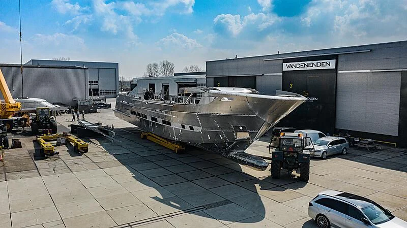 a large airplane is being loaded aboard BLUE JEANS Yacht for Sale