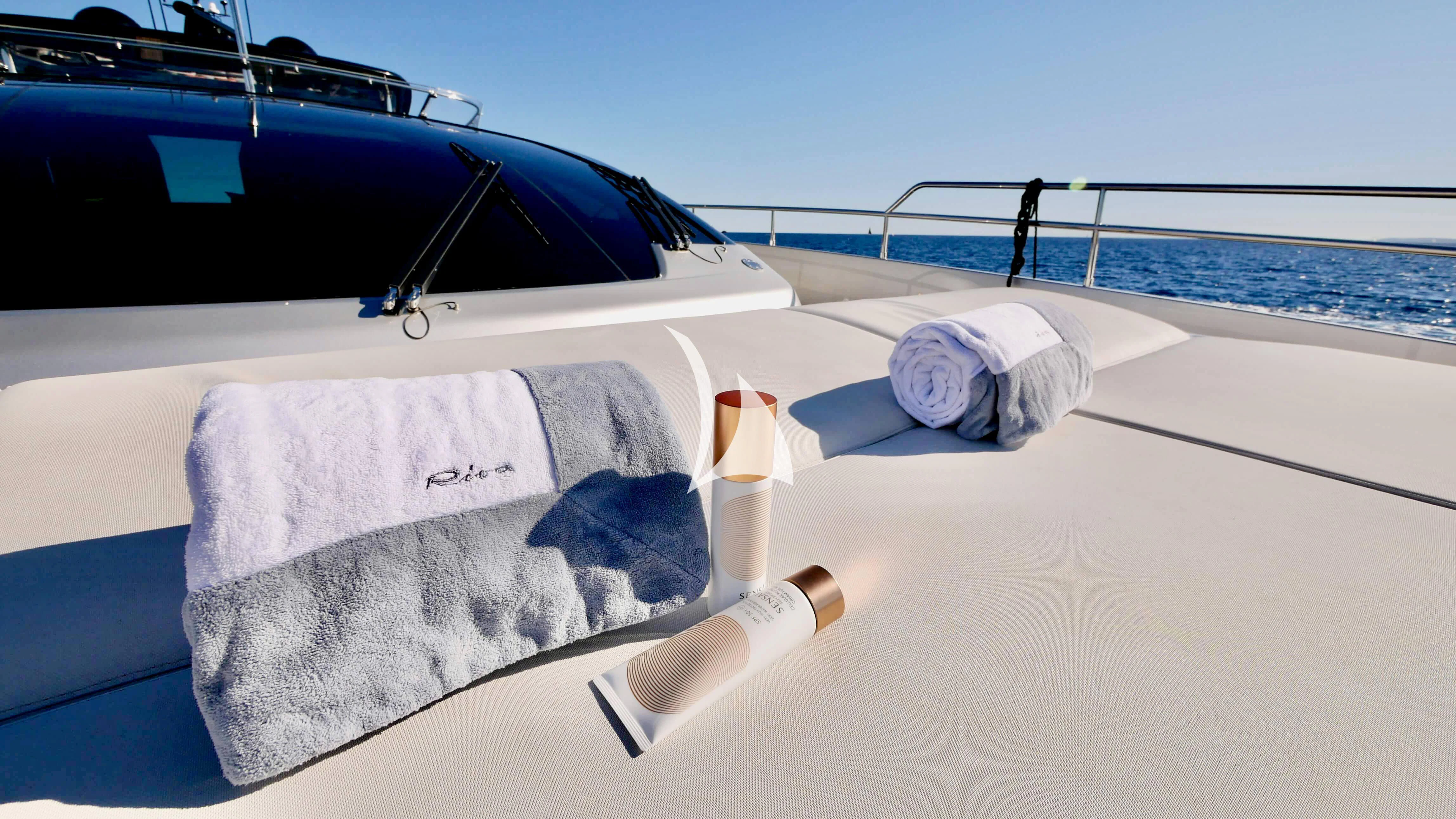 a boat on the beach aboard BASILIC Yacht for Sale