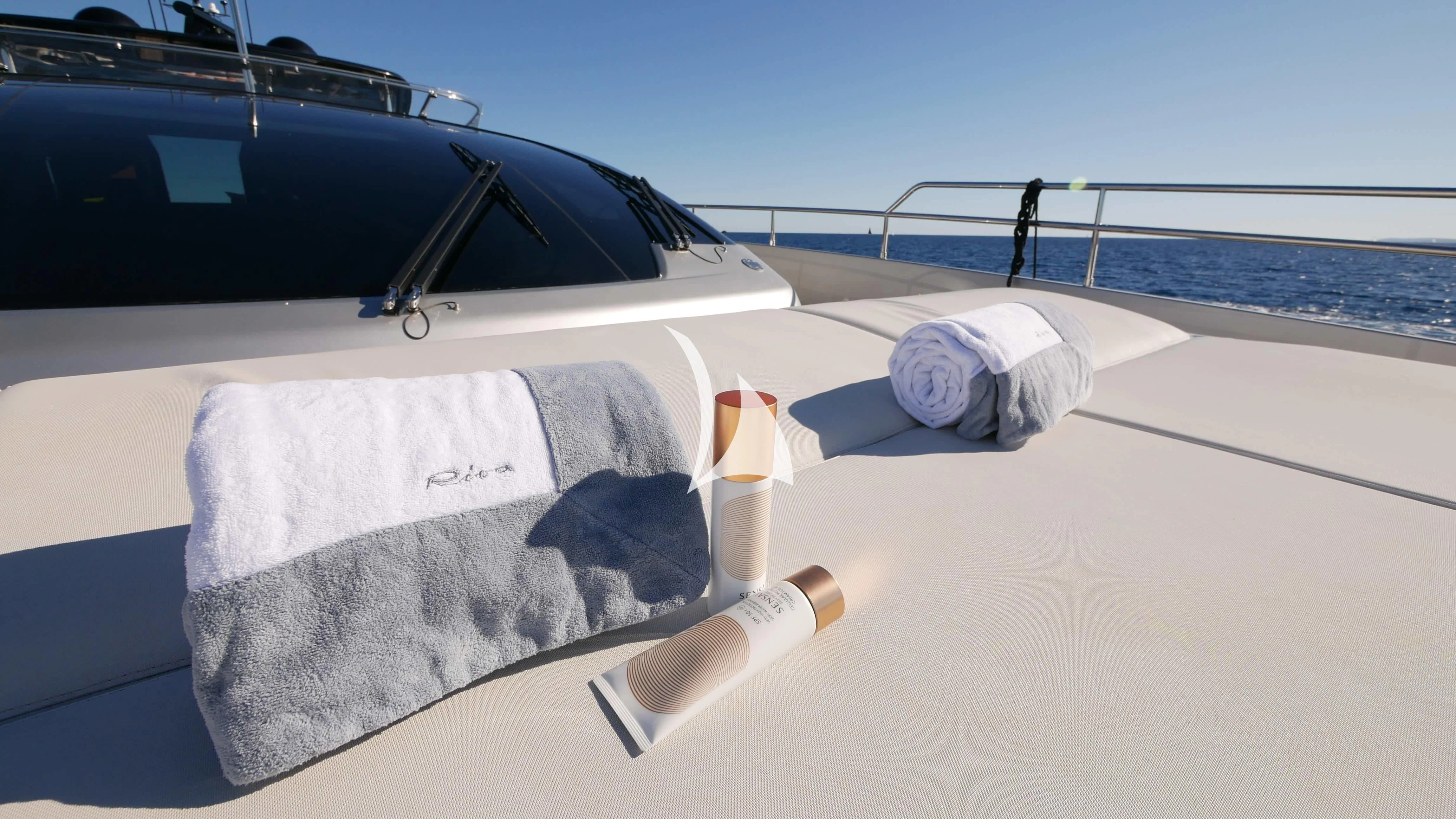 a boat with a towel on it aboard BASILIC Yacht for Sale