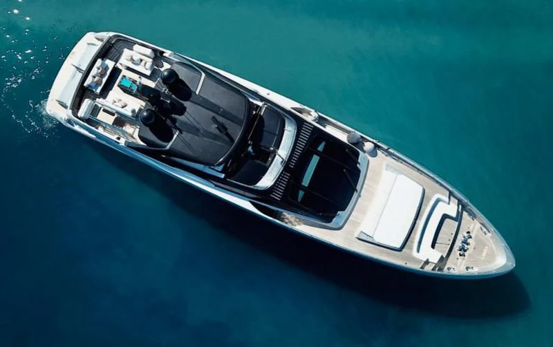a car on the water aboard BASILIC Yacht for Sale