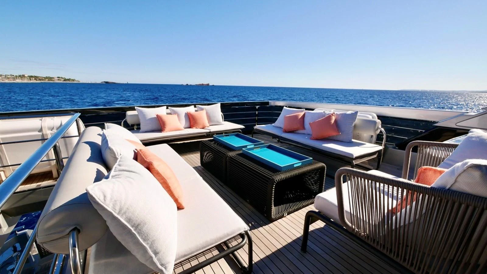 a deck with a pool and a table on it aboard BASILIC Yacht for Sale