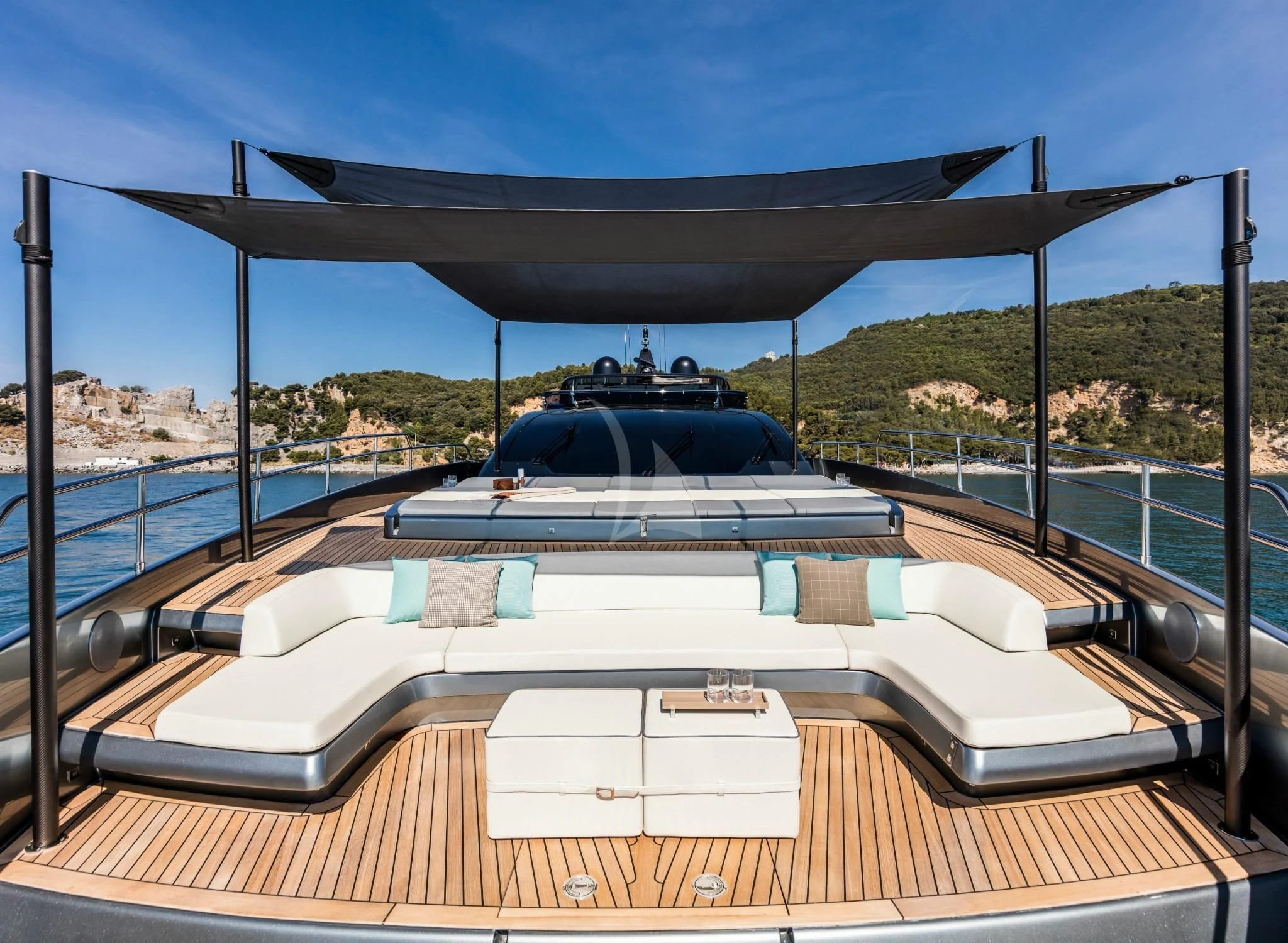 a deck with a pool and a large tank on it aboard BASILIC Yacht for Sale