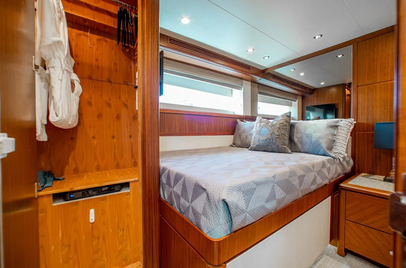 a bed in a room aboard TRINITY Yacht for Sale