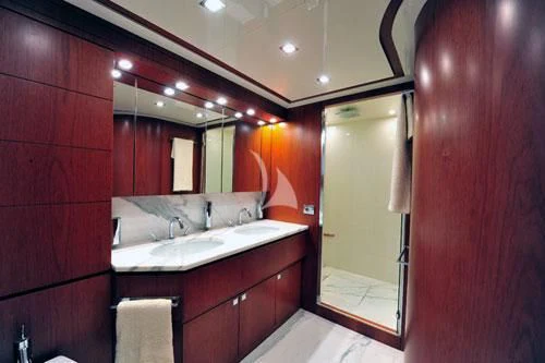 a bathroom with red cabinets aboard BIANCA Yacht for Sale