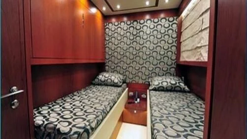 a room with two beds aboard BIANCA Yacht for Sale