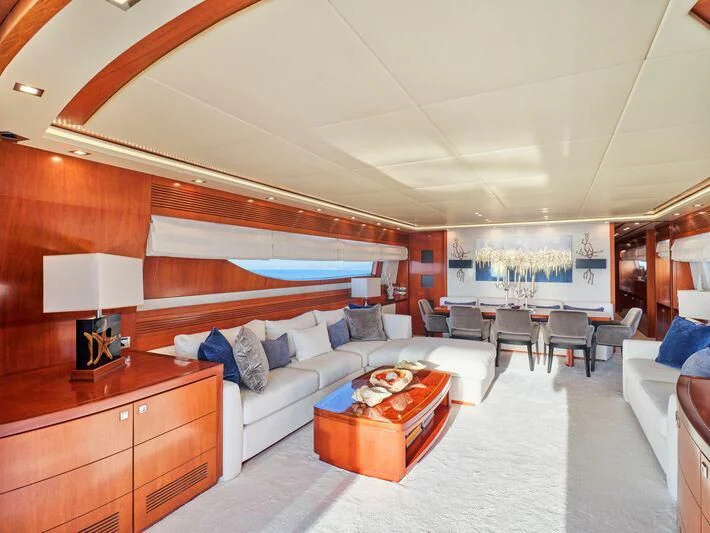a living room with a large bed aboard BIANCA Yacht for Sale