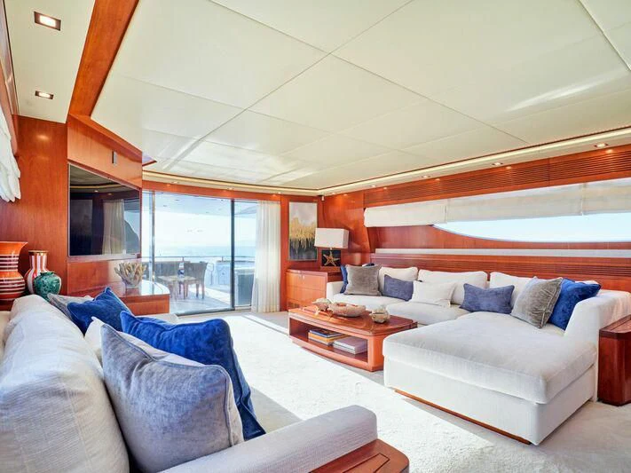 a living room with a large window aboard BIANCA Yacht for Sale