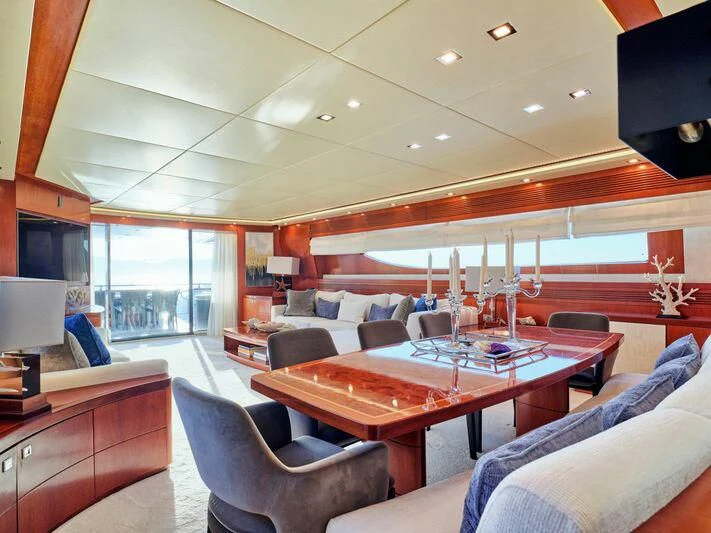 a living room with a large window aboard BIANCA Yacht for Sale