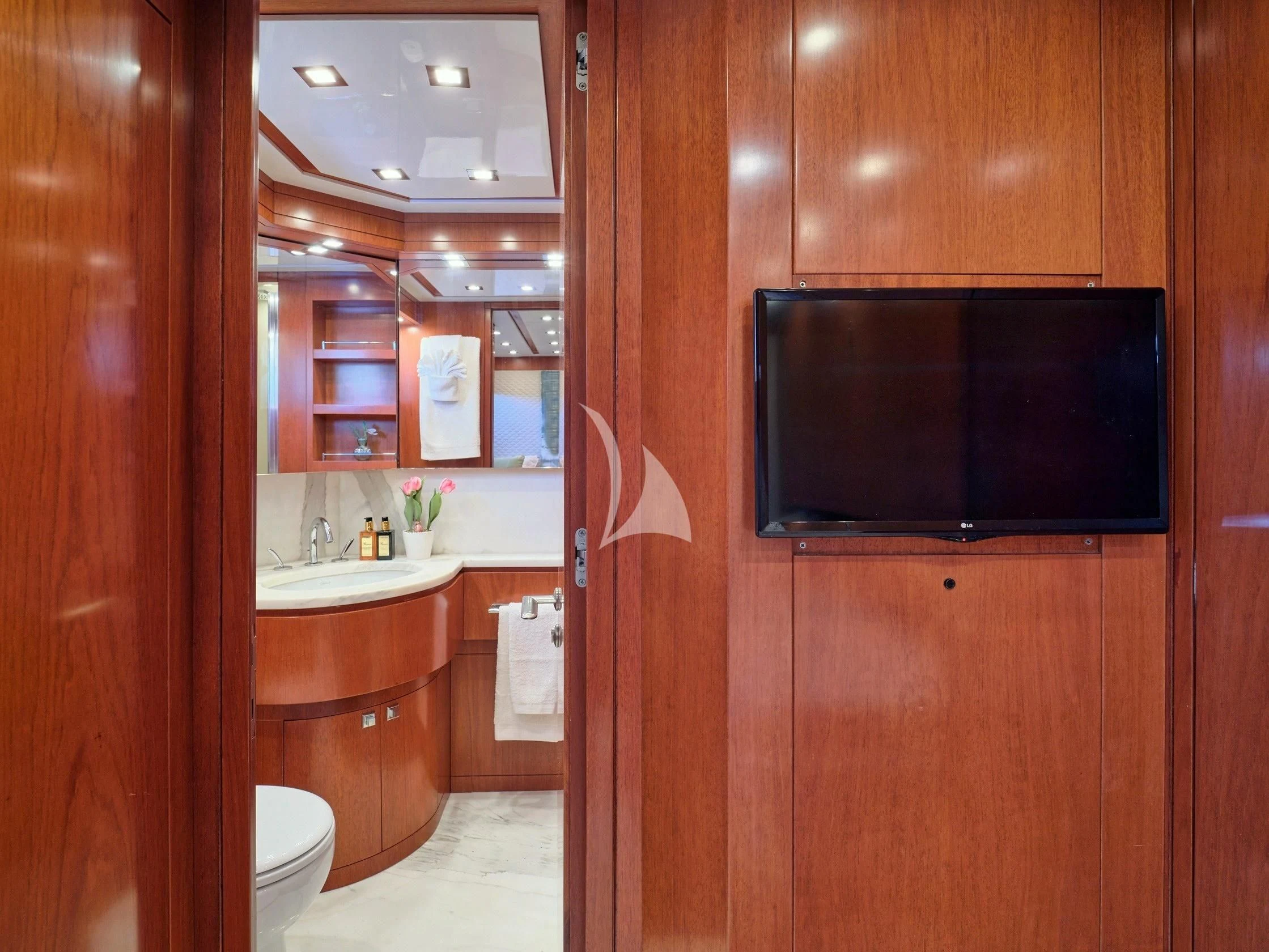 a bathroom with wooden cabinets aboard BIANCA Yacht for Sale