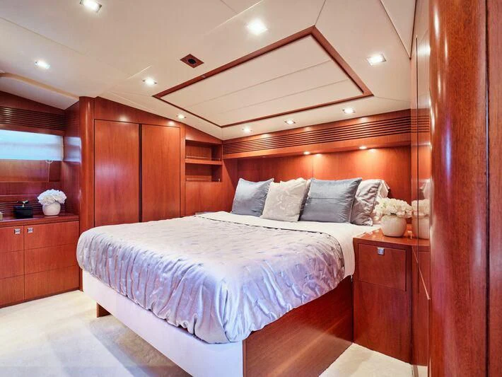 a bed in a room aboard BIANCA Yacht for Sale