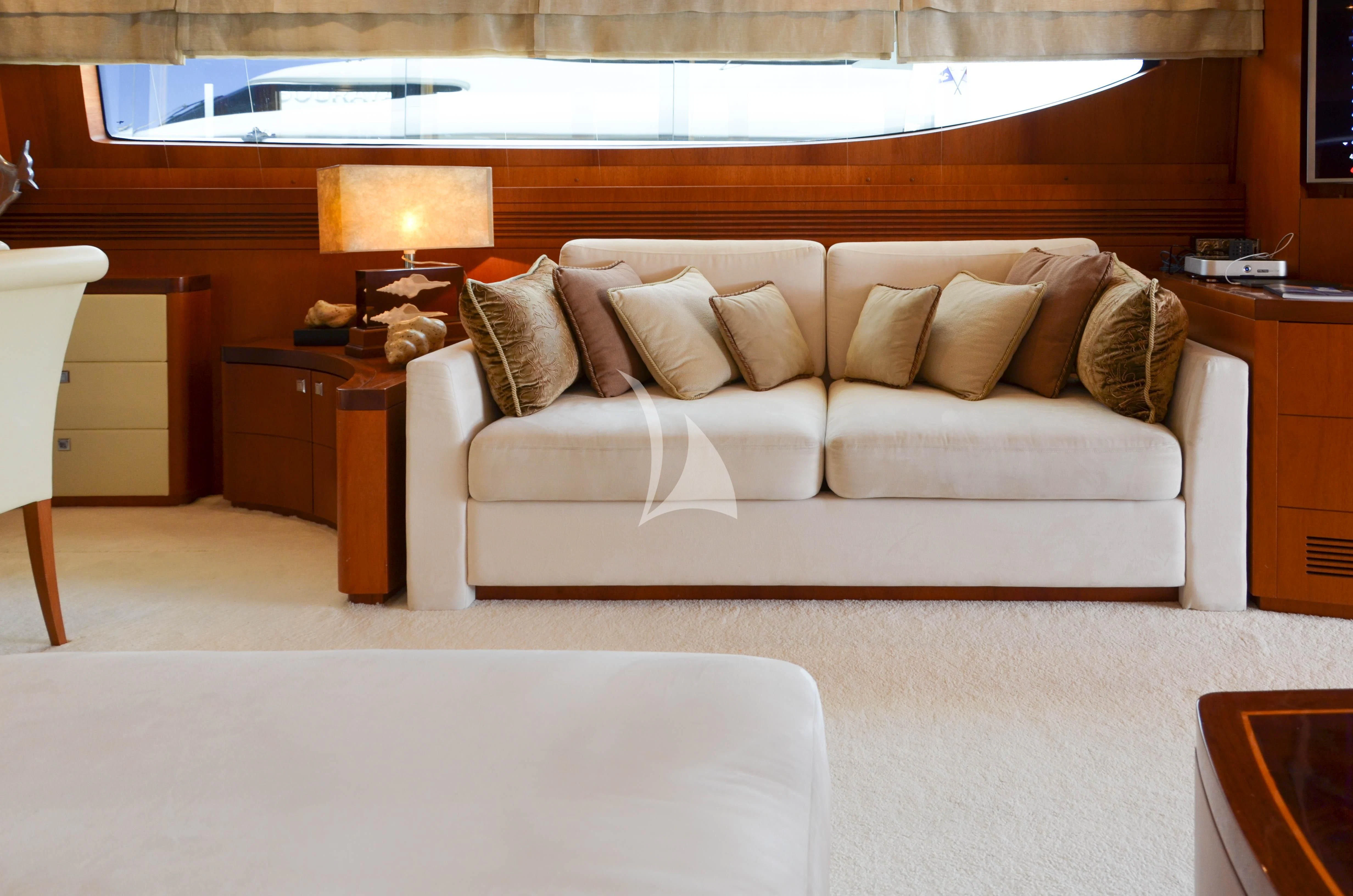 a white couch in a room aboard BIANCA Yacht for Sale