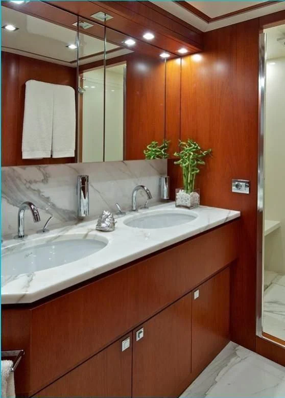 a bathroom with two sinks aboard BIANCA Yacht for Sale