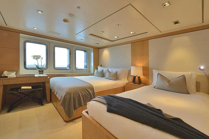 a room with two beds aboard TRIPLE SEVEN Yacht for Sale