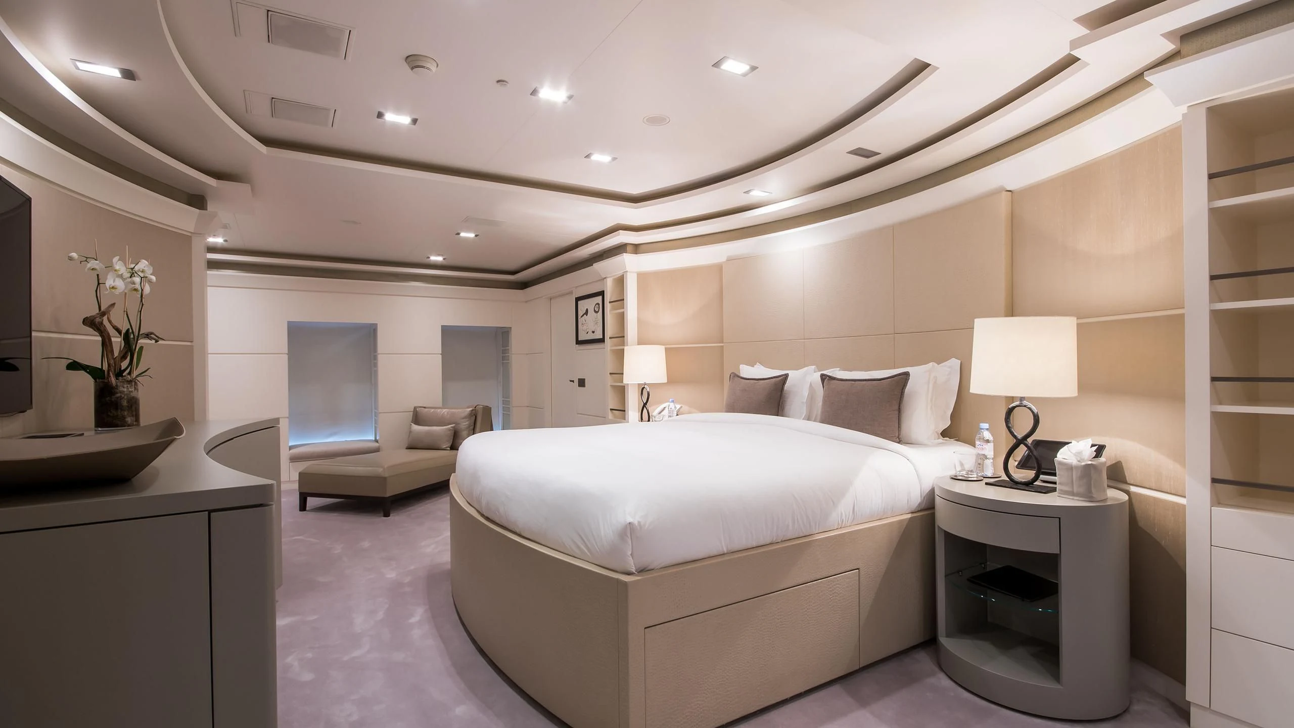 a large white bed in a room aboard TRIPLE SEVEN Yacht for Sale