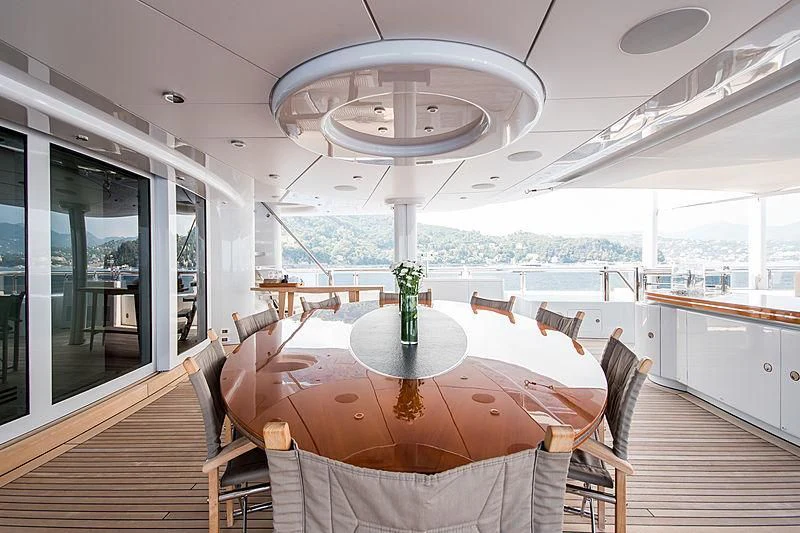 a dining table on a boat aboard TRIPLE SEVEN Yacht for Sale