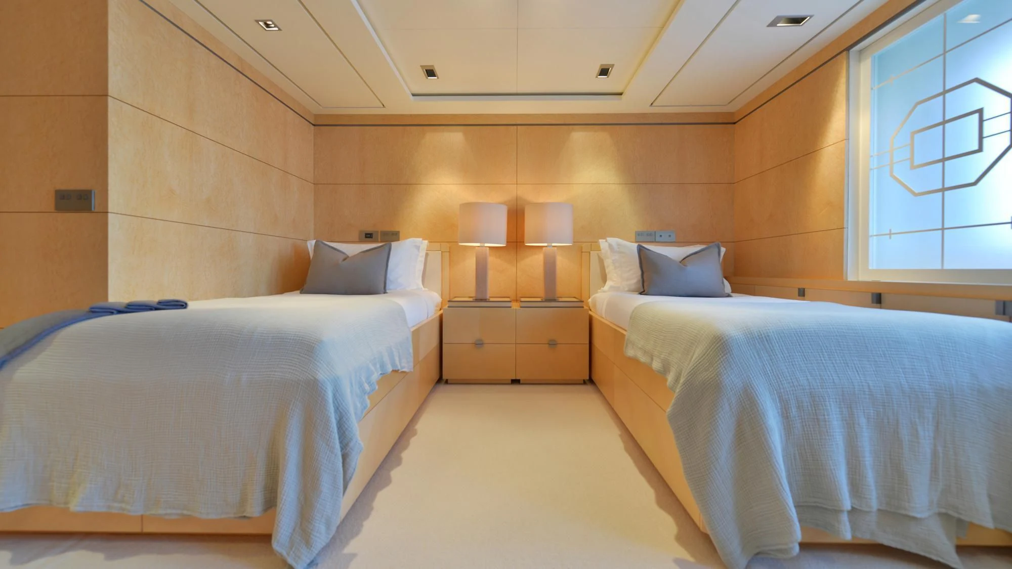 a room with two beds aboard TRIPLE SEVEN Yacht for Sale