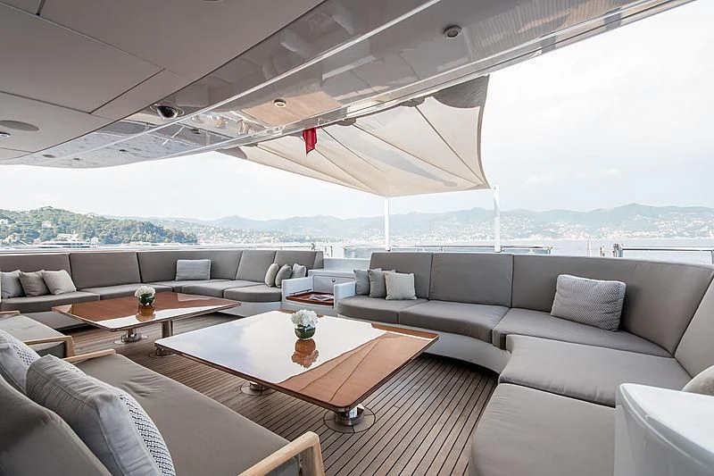 a living room with a large window aboard TRIPLE SEVEN Yacht for Sale
