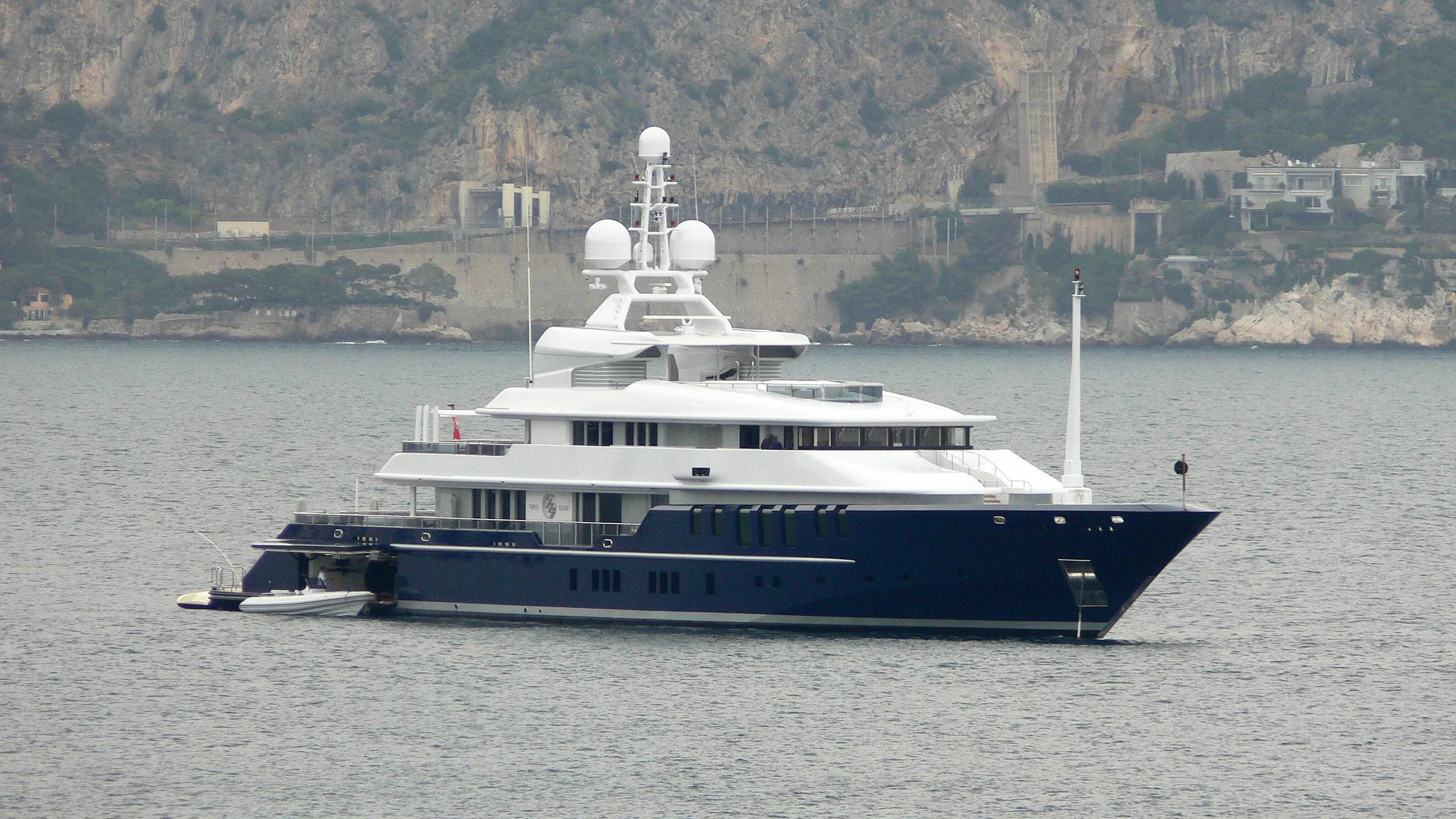 a large boat in the water aboard TRIPLE SEVEN Yacht for Sale