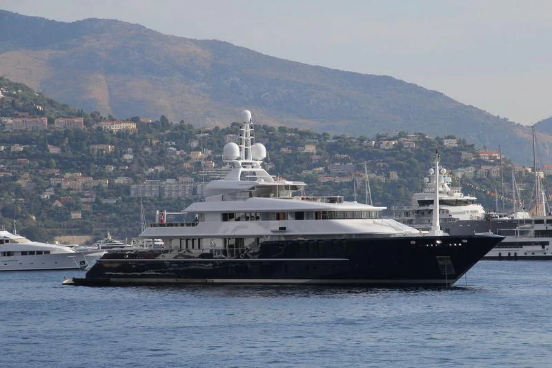 a large ship in the water aboard TRIPLE SEVEN Yacht for Sale