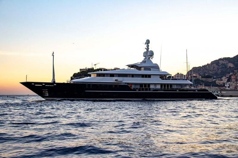 a large boat in the water aboard TRIPLE SEVEN Yacht for Sale