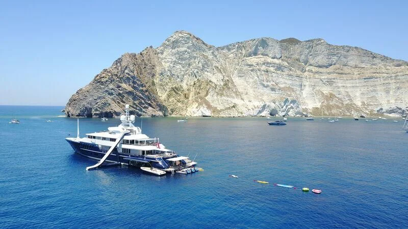 a boat in the water aboard TRIPLE SEVEN Yacht for Sale