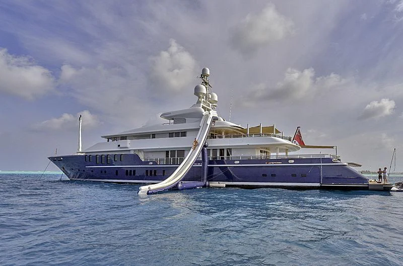 a large boat in the water aboard TRIPLE SEVEN Yacht for Sale