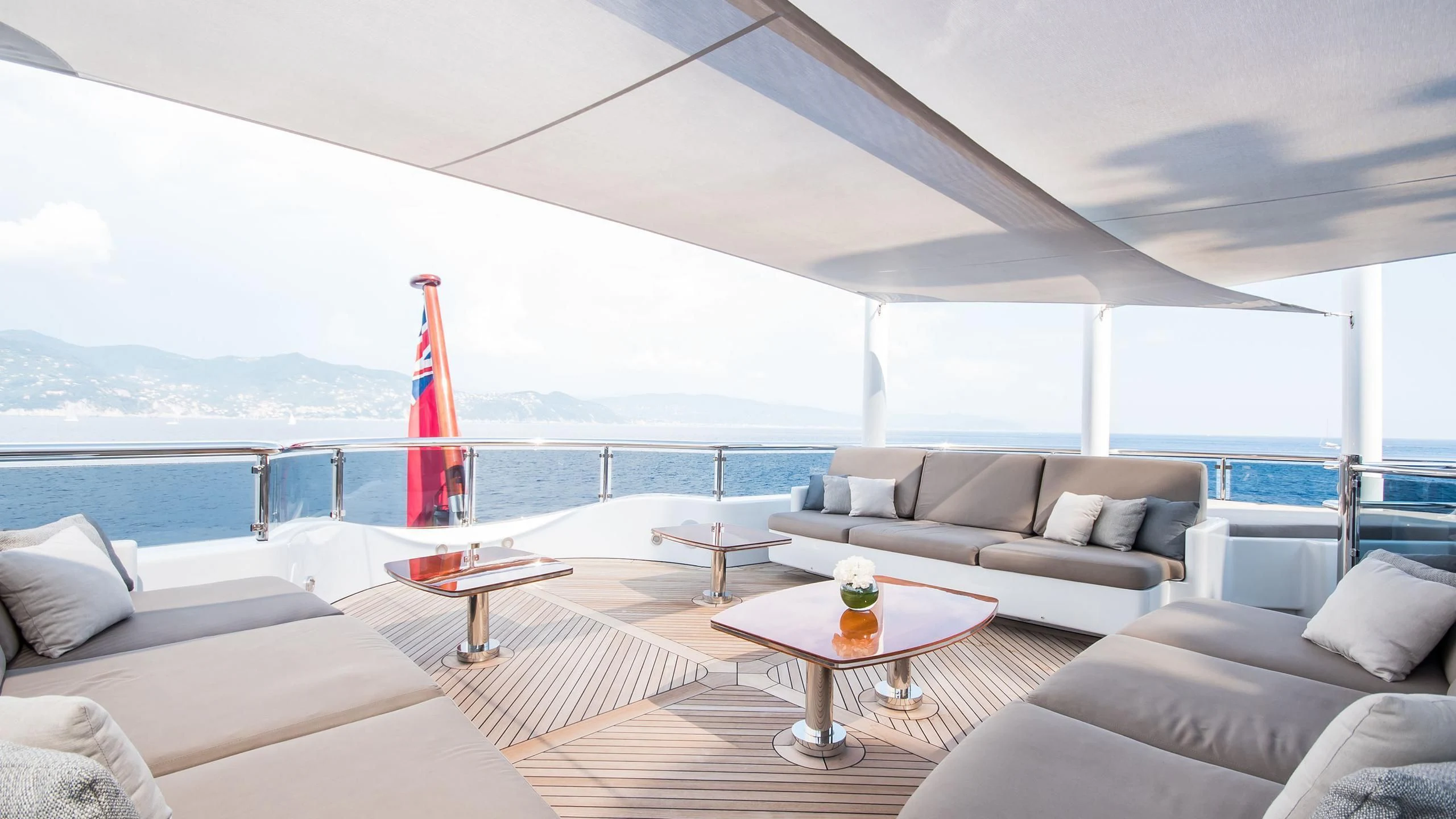 a living room with a large body of water aboard TRIPLE SEVEN Yacht for Sale
