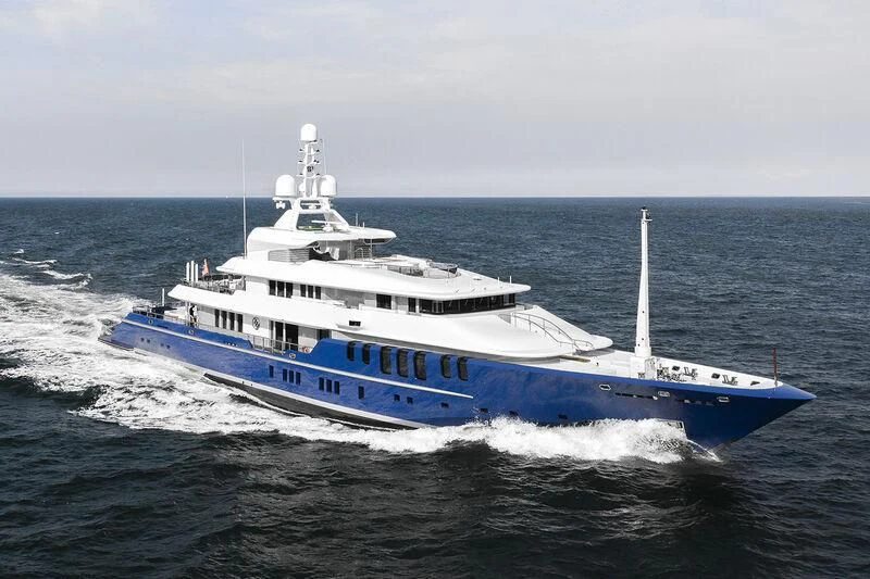 a large blue and white boat aboard TRIPLE SEVEN Yacht for Sale