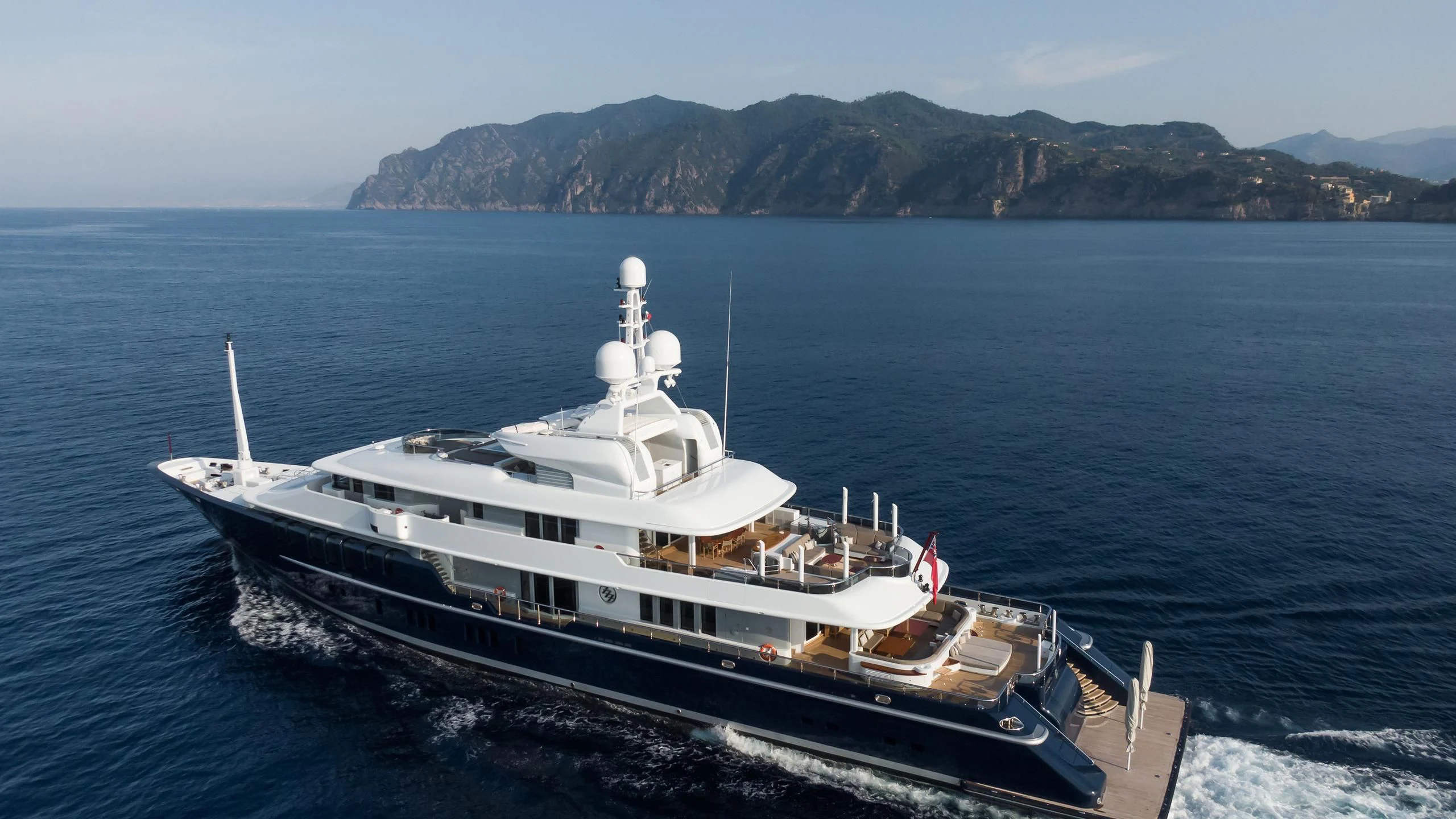 a ship on the water aboard TRIPLE SEVEN Yacht for Sale