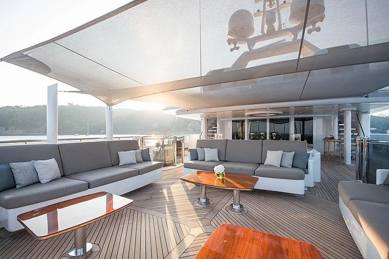 a living room with a large window aboard TRIPLE SEVEN Yacht for Sale
