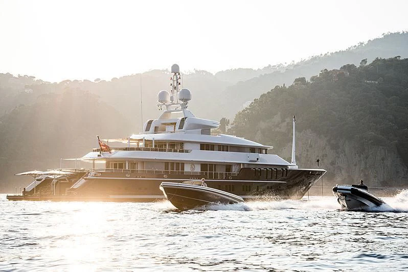 a large ship in the water aboard TRIPLE SEVEN Yacht for Sale