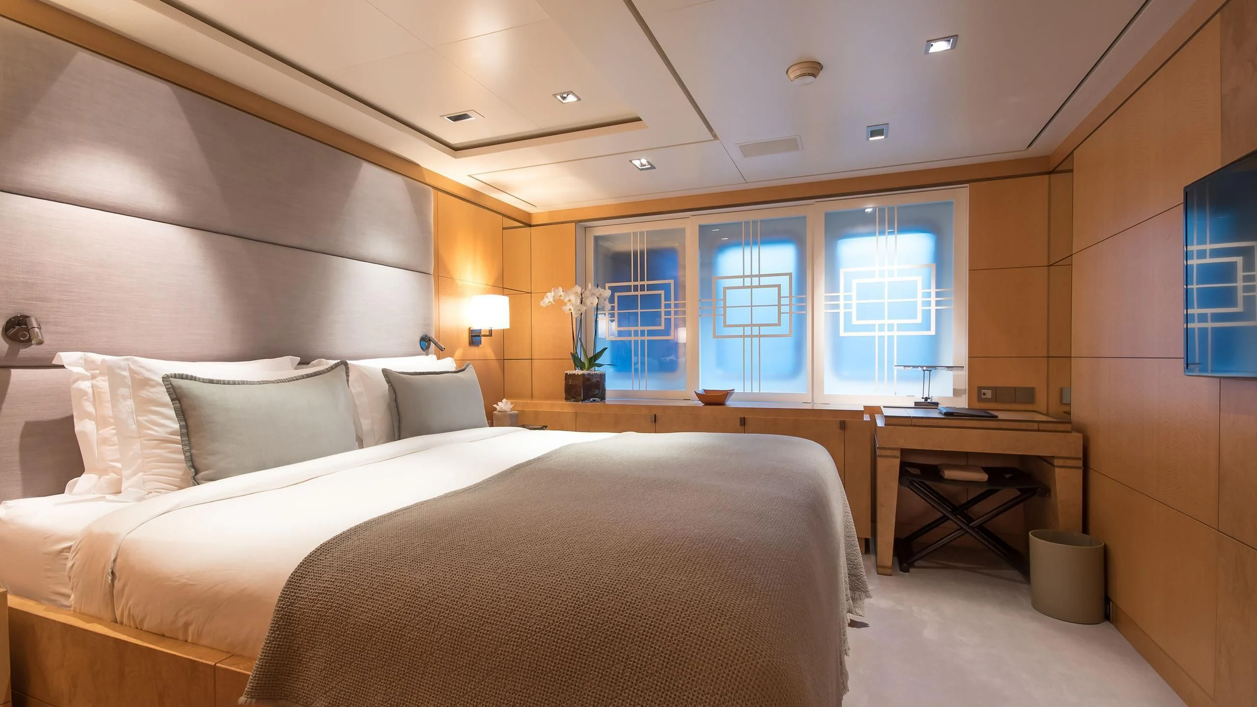 a bed in a room aboard TRIPLE SEVEN Yacht for Sale