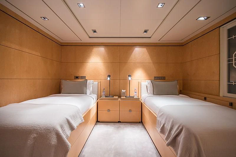 a room with two beds aboard TRIPLE SEVEN Yacht for Sale