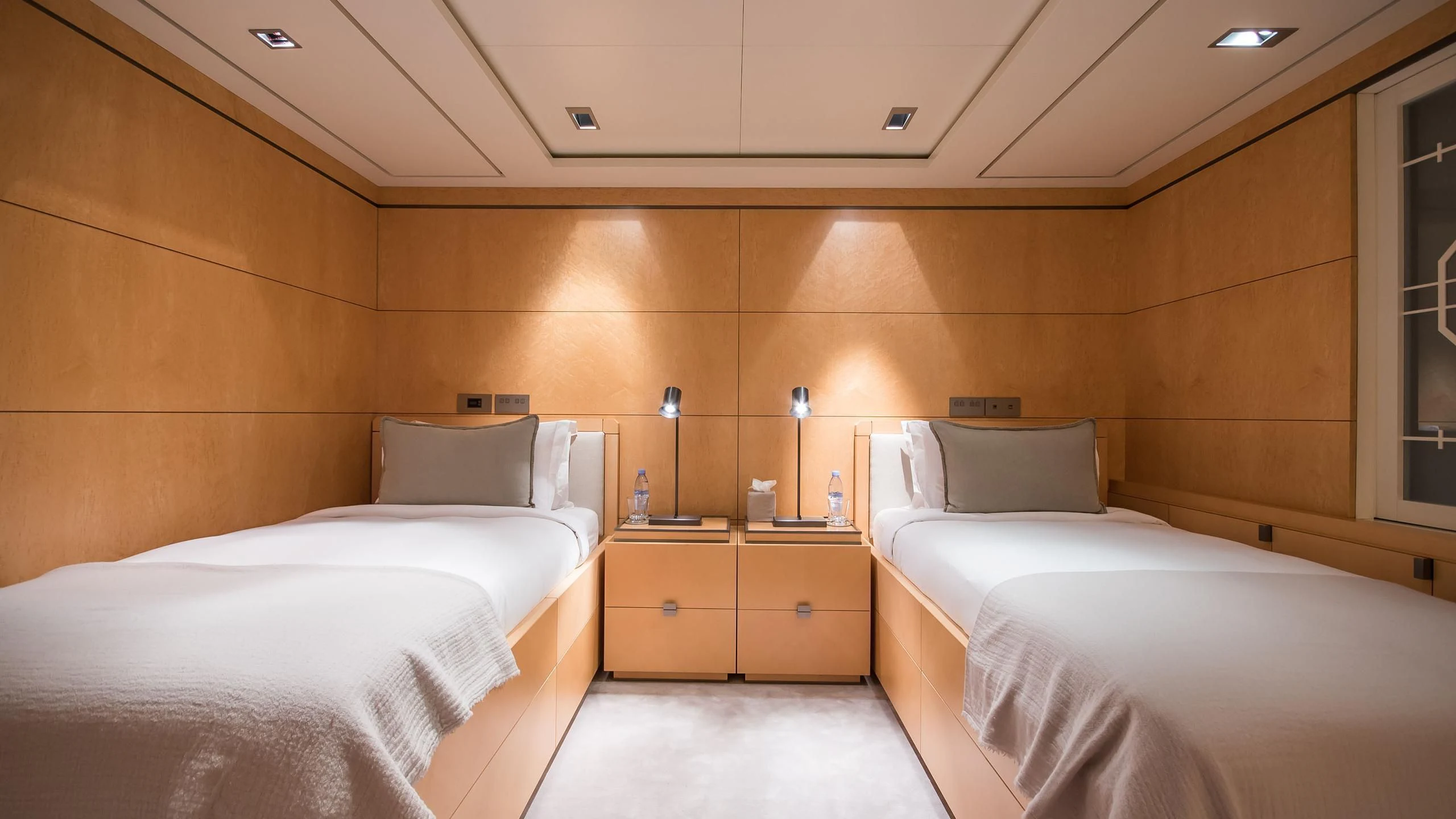 a room with two beds aboard TRIPLE SEVEN Yacht for Sale