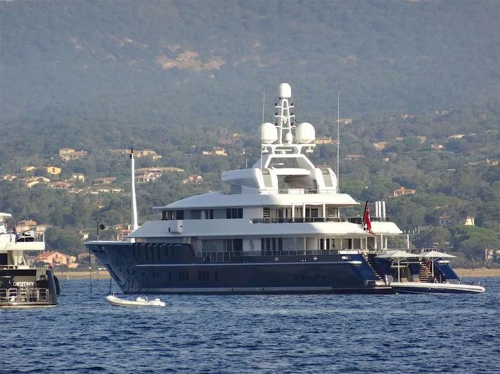 a large ship in the water aboard TRIPLE SEVEN Yacht for Sale