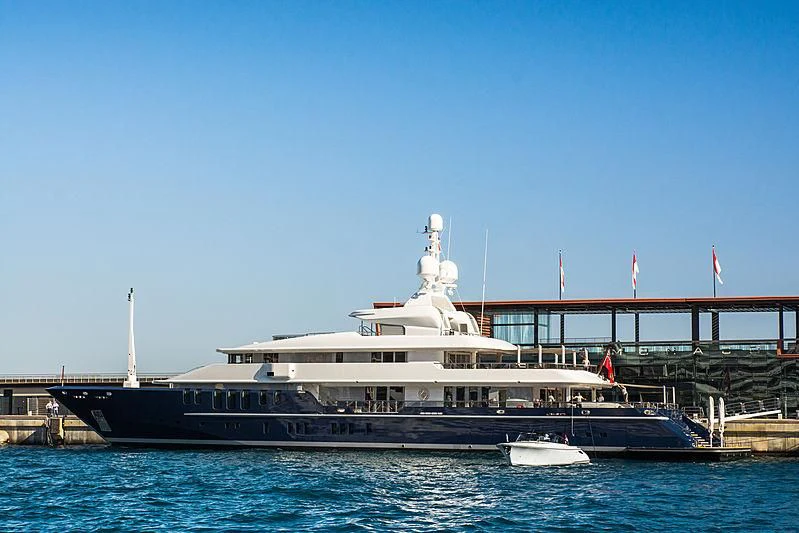 a large boat in the water aboard TRIPLE SEVEN Yacht for Sale
