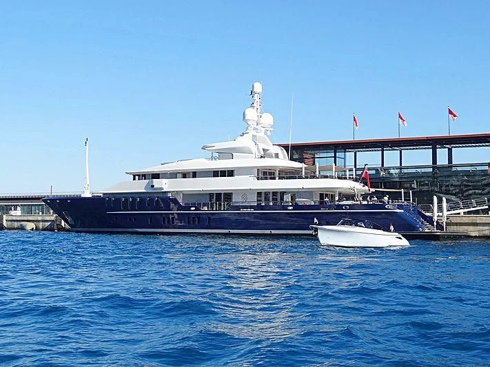 a large boat in the water aboard TRIPLE SEVEN Yacht for Sale
