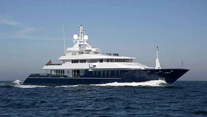 a large ship in the water aboard TRIPLE SEVEN Yacht for Sale