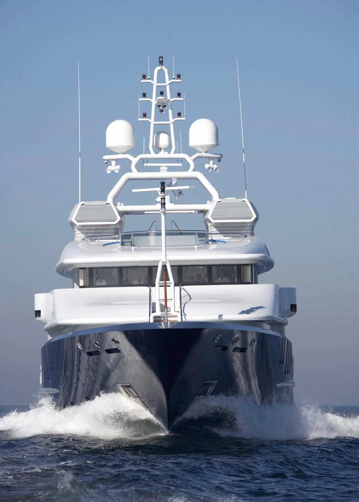 a white boat in the water aboard TRIPLE SEVEN Yacht for Sale