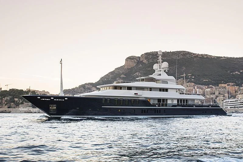 a large boat in the water aboard TRIPLE SEVEN Yacht for Sale