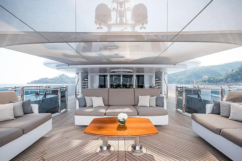 a living room with a large window aboard TRIPLE SEVEN Yacht for Sale