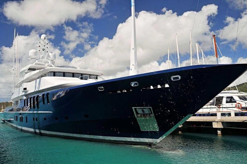 a large ship in the water aboard TRIPLE SEVEN Yacht for Sale