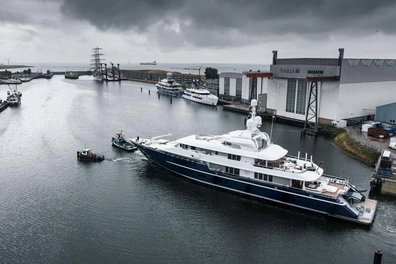 a large ship in the water aboard TRIPLE SEVEN Yacht for Sale