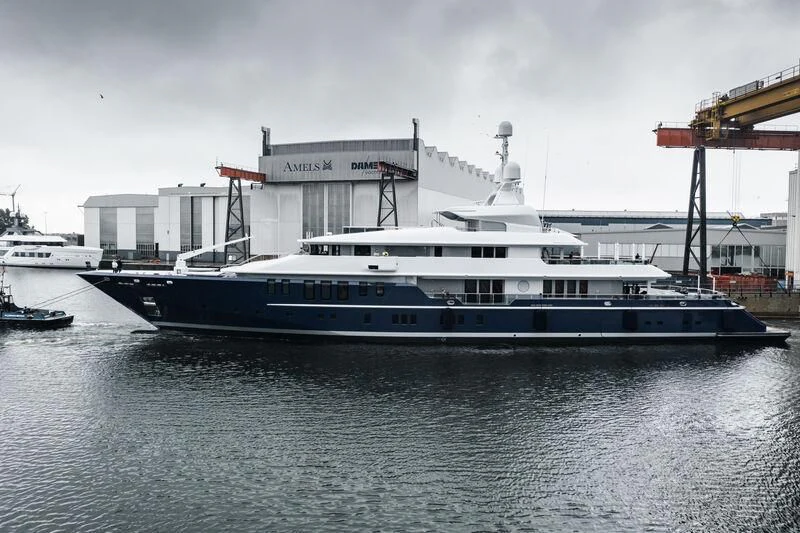 a large boat in the water aboard TRIPLE SEVEN Yacht for Sale