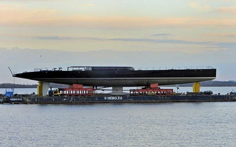 a large ship on a dock aboard ANATTA Yacht for Sale