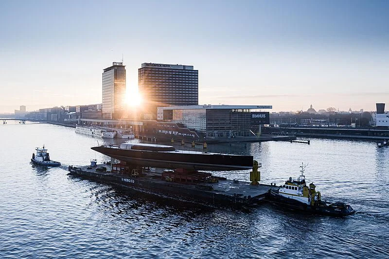 a large ship in the water aboard ANATTA Yacht for Sale