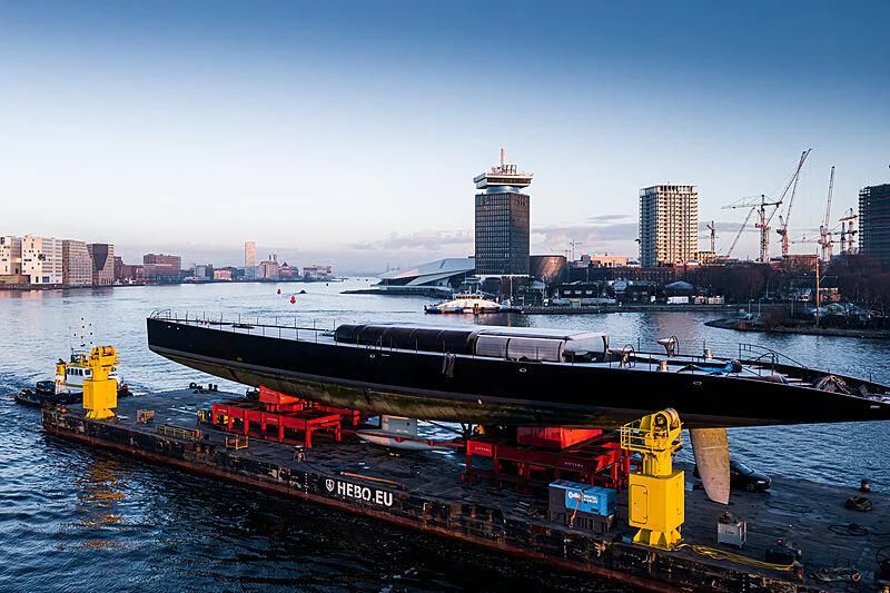 a large ship in the water aboard ANATTA Yacht for Sale