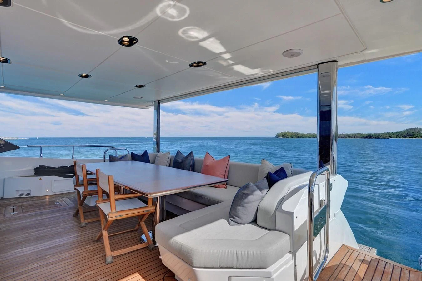 a room with a table and chairs aboard ENCHANTE Yacht for Sale